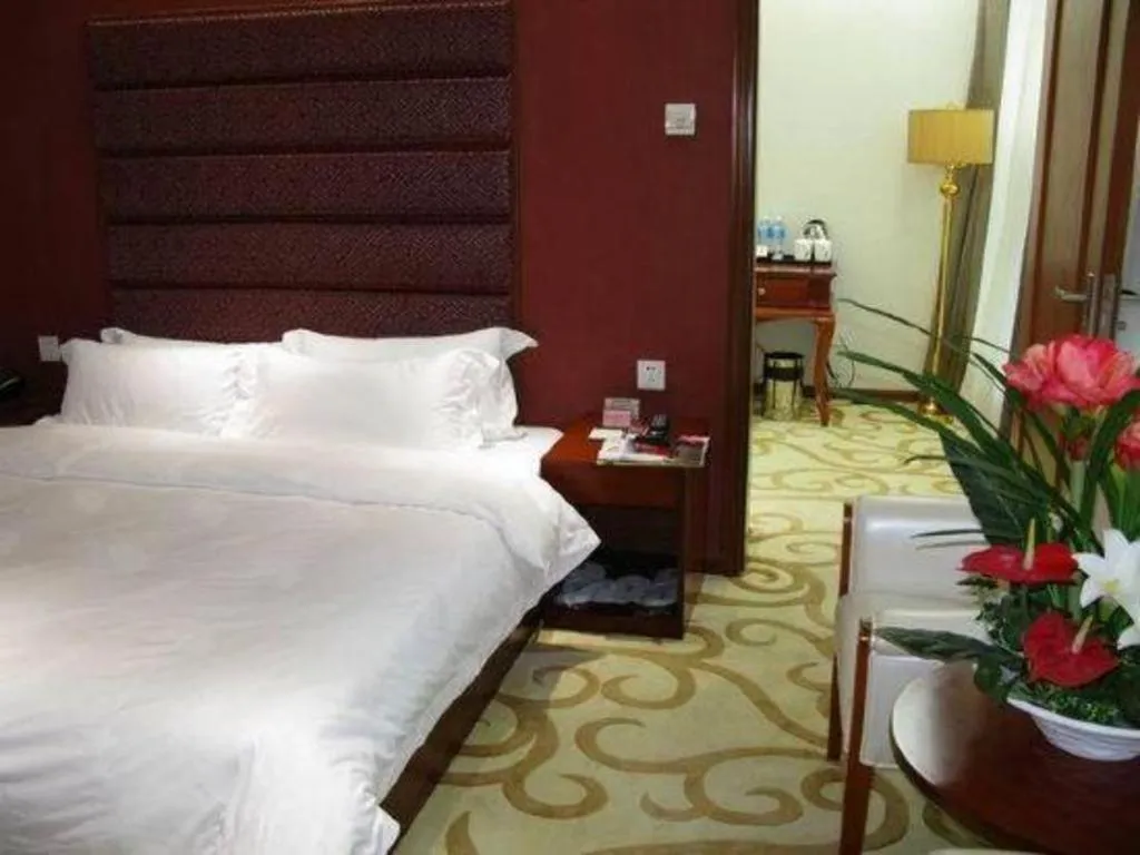 Bed in Milu Hotel