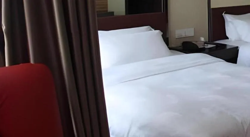 Bed in Milu Hotel