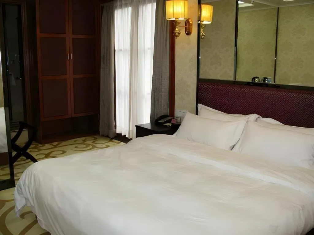 Bed in Milu Hotel