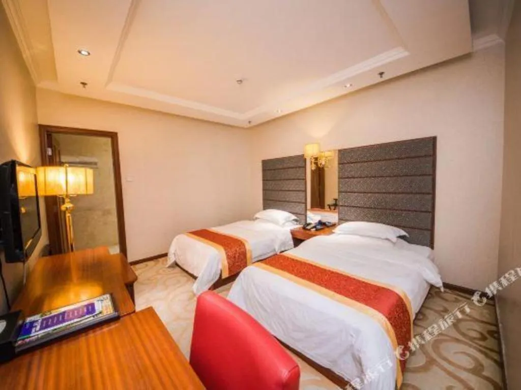 Bed in Milu Hotel