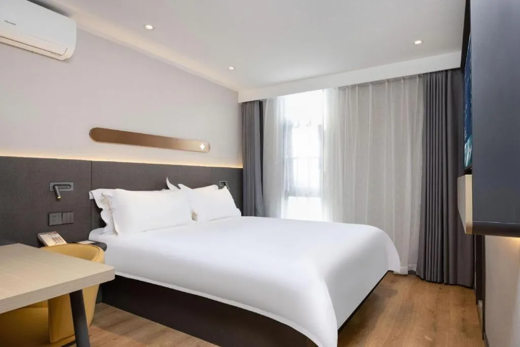 Bed in Jinjiang Inn Shenzhen Airport