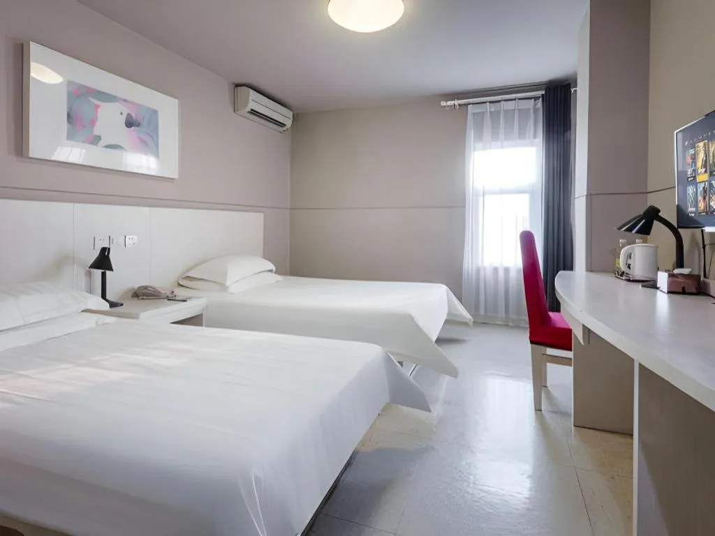 Bed in Jinjiang Inn Shenzhen Airport