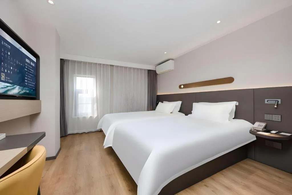 Bed in Jinjiang Inn Shenzhen Airport