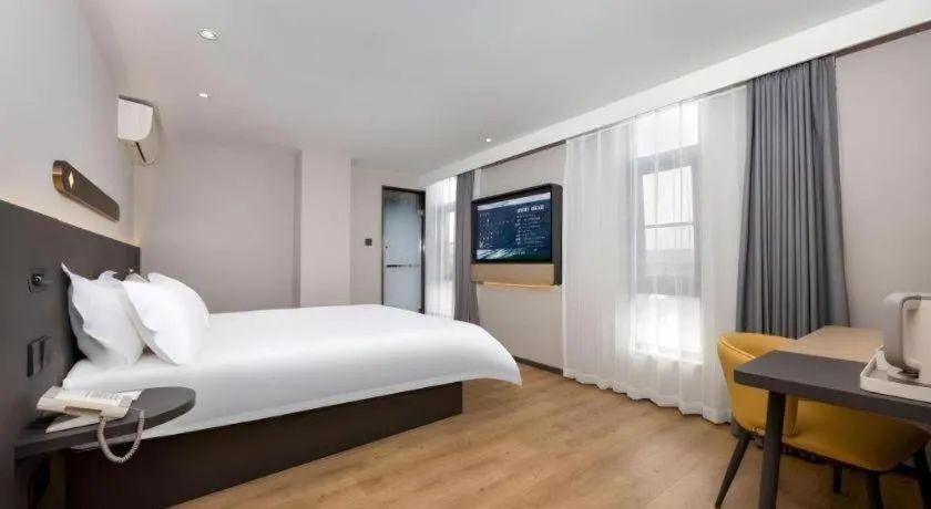 Bed in Jinjiang Inn Shenzhen Airport