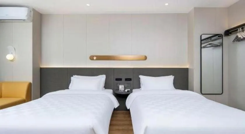 Bed in Jinjiang Inn Zhuhai Xiangzhou Qinglv Middle Road Theater