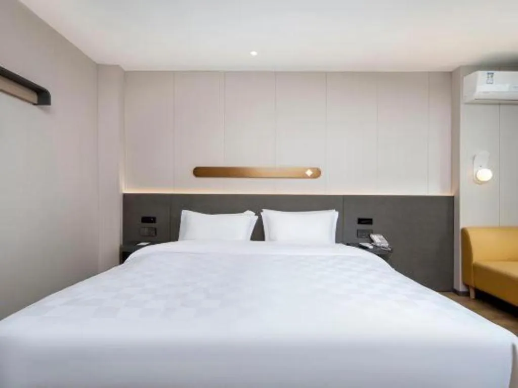 Bed in Jinjiang Inn Zhuhai Xiangzhou Qinglv Middle Road Theater