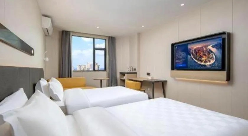 Bed in Jinjiang Inn Zhuhai Xiangzhou Qinglv Middle Road Theater