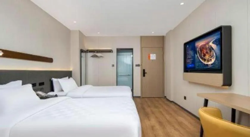 Bed in Jinjiang Inn Zhuhai Xiangzhou Qinglv Middle Road Theater