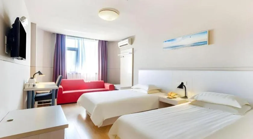 Bed in Jinjiang Inn Zhuhai Xiangzhou Qinglv Middle Road Theater