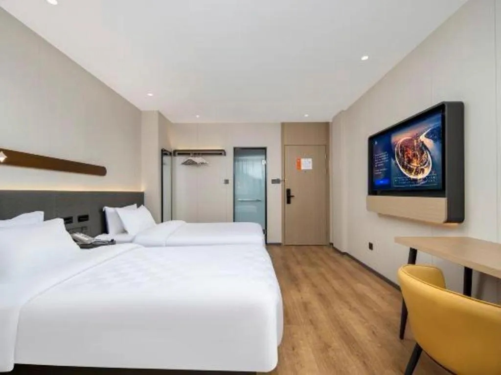 Bed in Jinjiang Inn Zhuhai Xiangzhou Qinglv Middle Road Theater