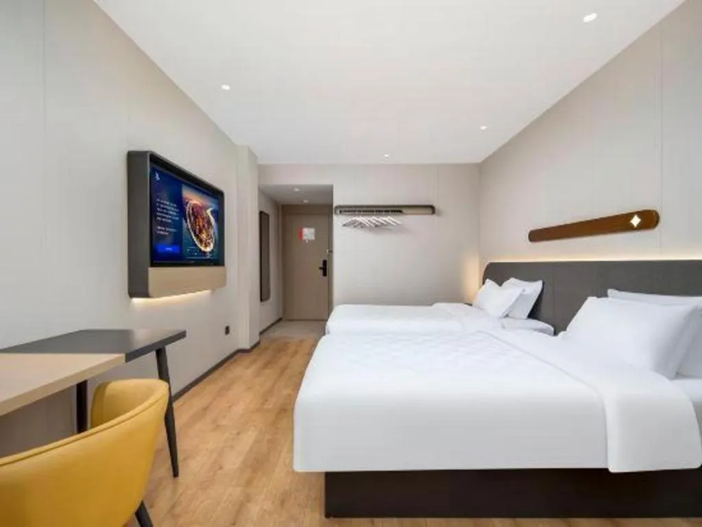 Bed in Jinjiang Inn Zhuhai Xiangzhou Qinglv Middle Road Theater