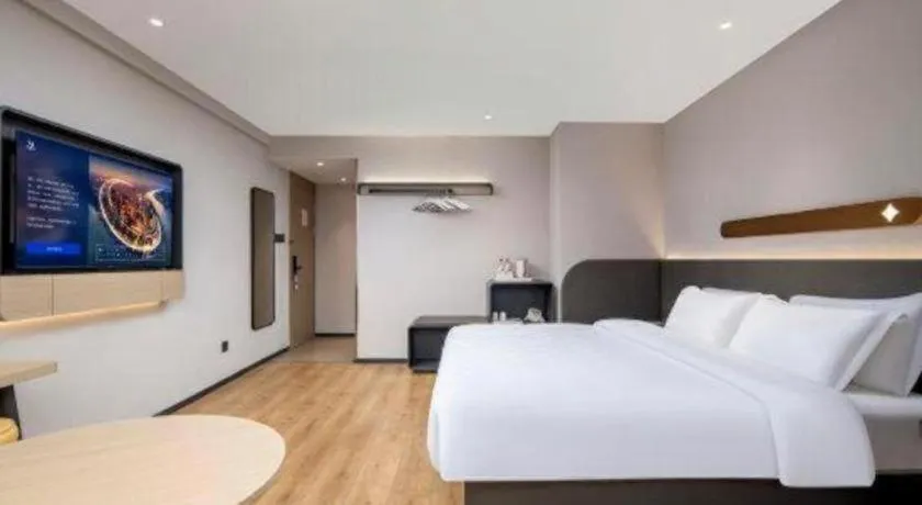 Bed in Jinjiang Inn Zhuhai Xiangzhou Qinglv Middle Road Theater