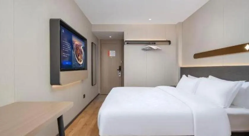 Bed in Jinjiang Inn Zhuhai Xiangzhou Qinglv Middle Road Theater