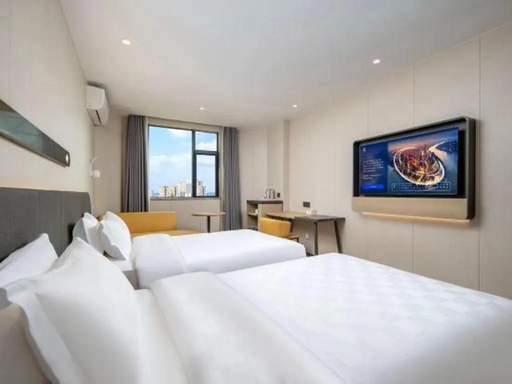 Bed in Jinjiang Inn Zhuhai Xiangzhou Qinglv Middle Road Theater