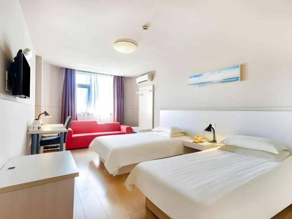 Bed in Jinjiang Inn Zhuhai Xiangzhou Qinglv Middle Road Theater