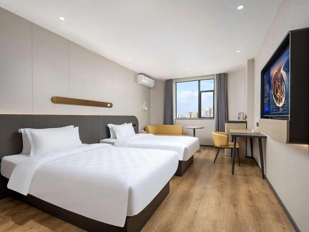 Bed in Jinjiang Inn Zhuhai Xiangzhou Qinglv Middle Road Theater