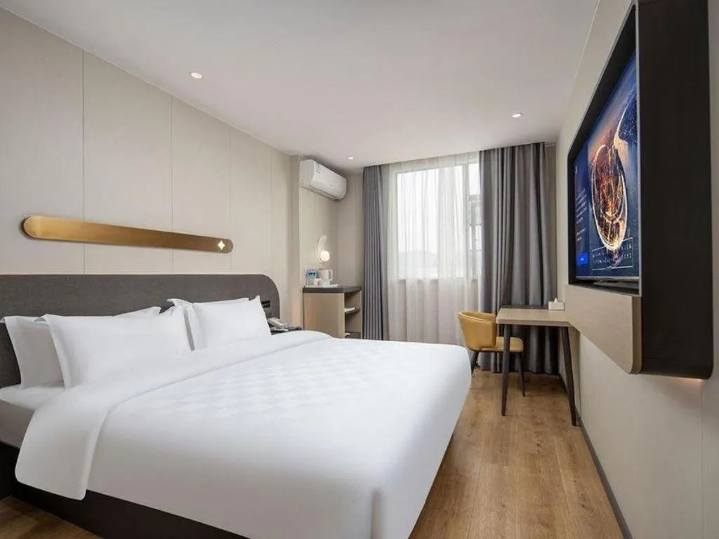 Bed in Jinjiang Inn Zhuhai Xiangzhou Qinglv Middle Road Theater