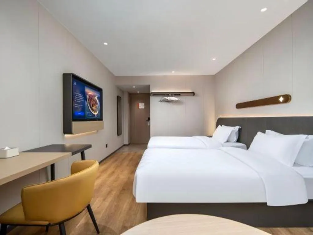 Bed in Jinjiang Inn Zhuhai Xiangzhou Qinglv Middle Road Theater