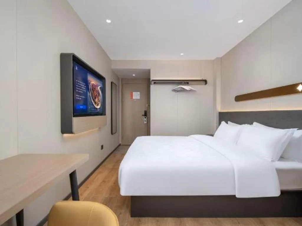 Bed in Jinjiang Inn Zhuhai Xiangzhou Qinglv Middle Road Theater