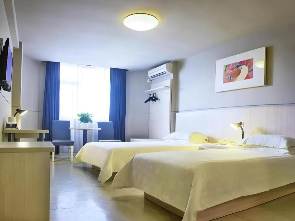 Bed in Jinjiang Inn Zhuhai Xiangzhou Qinglv Middle Road Theater