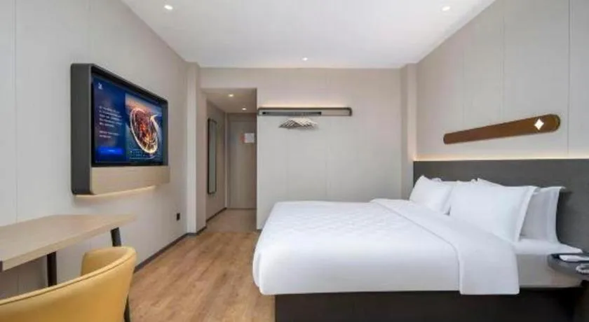 Bed in Jinjiang Inn Zhuhai Xiangzhou Qinglv Middle Road Theater