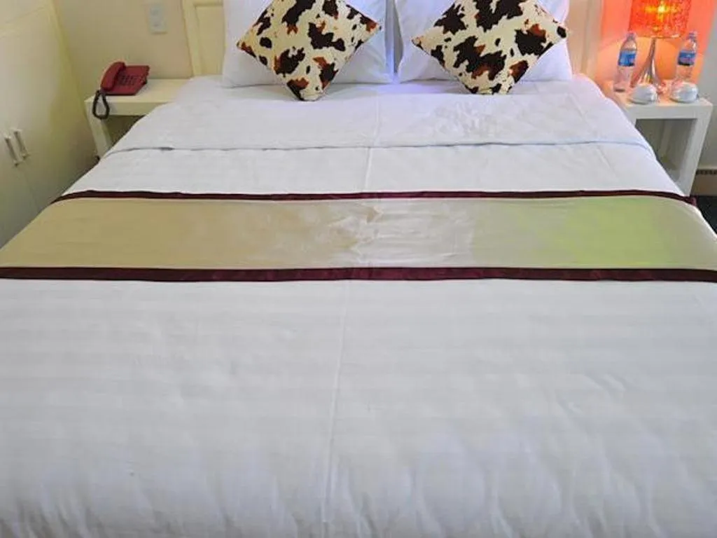 Bed in Ideal Hotel Hue