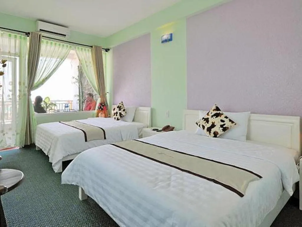 Bed in Ideal Hotel Hue