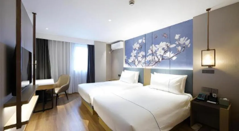 Bed in Jinjiang Inn Shanghai Lujiazui