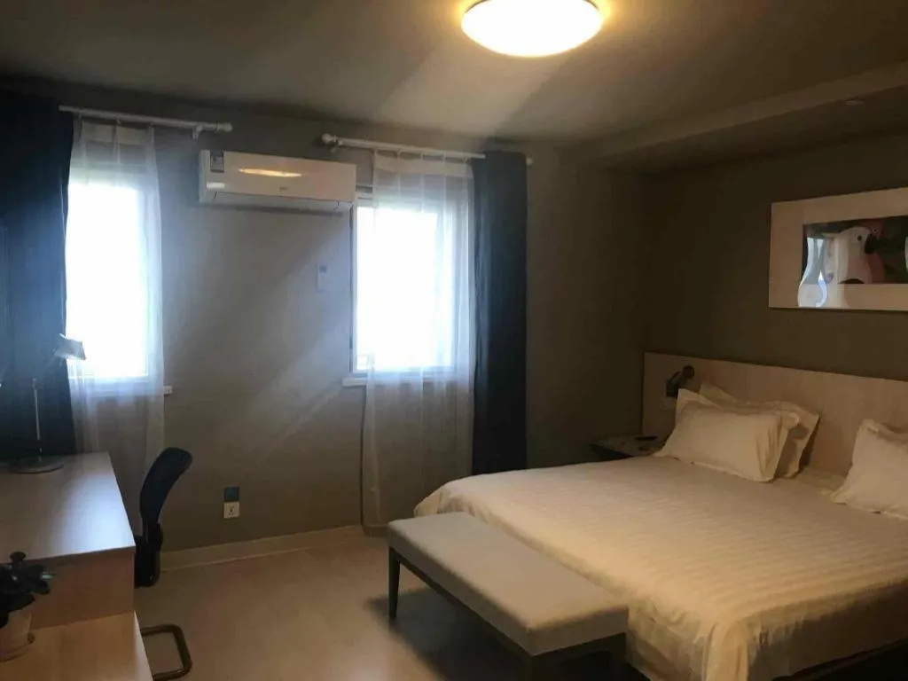 Bed in Jinjiang Inn Shanghai Lujiazui