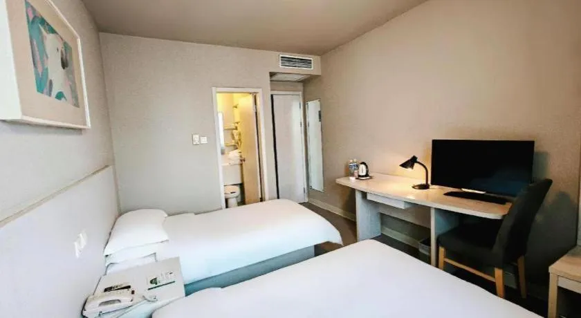 Bed in Jinjiang Inn Shenyang North Station