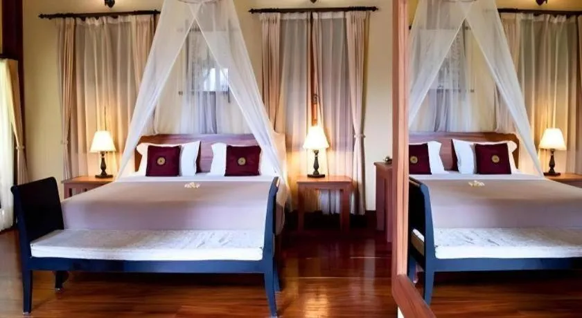 Bed in Le Bel Air Resort Luang Prabang