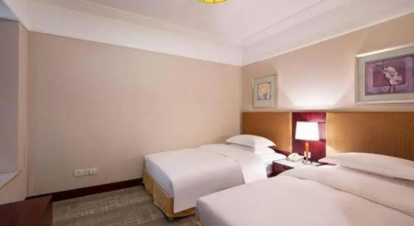 Bed in Golden Diamond Hotel Zhongshan