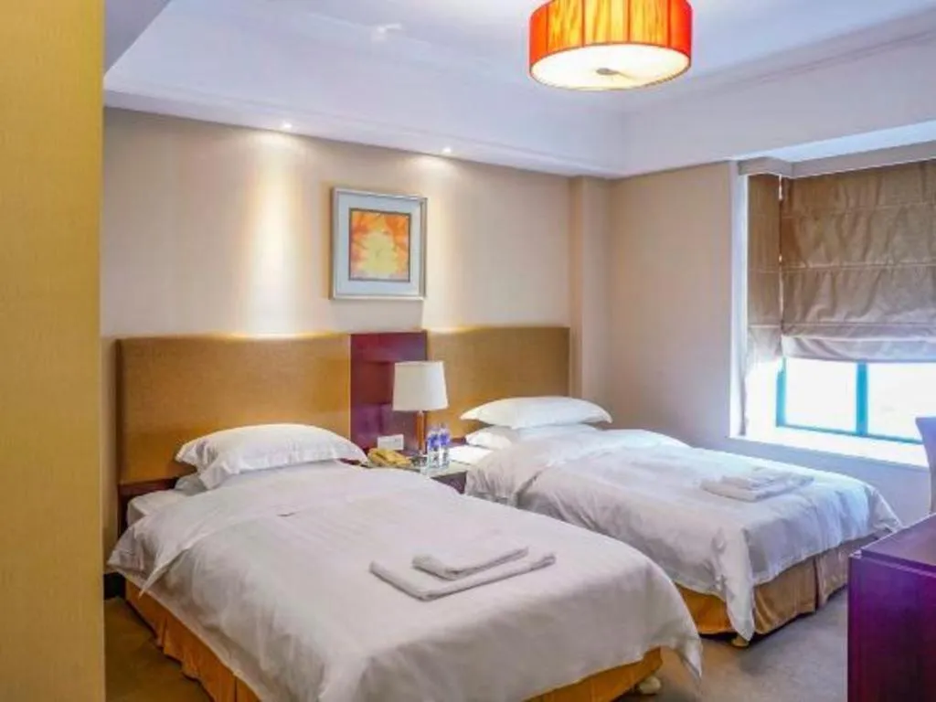 Bed in Golden Diamond Hotel Zhongshan