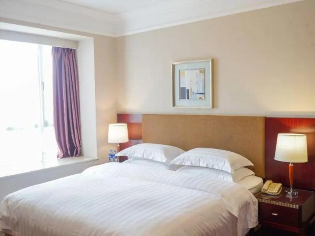 Bed in Golden Diamond Hotel Zhongshan