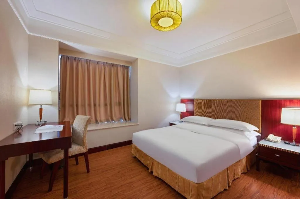 Bed in Golden Diamond Hotel Zhongshan