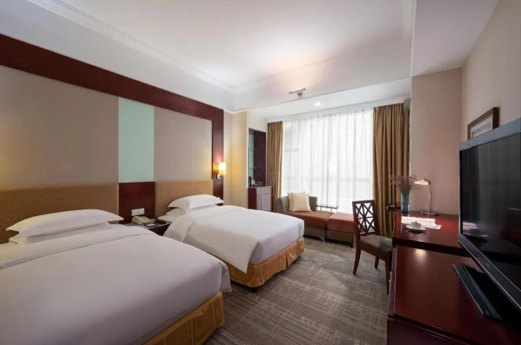 Bed in Golden Diamond Hotel Zhongshan