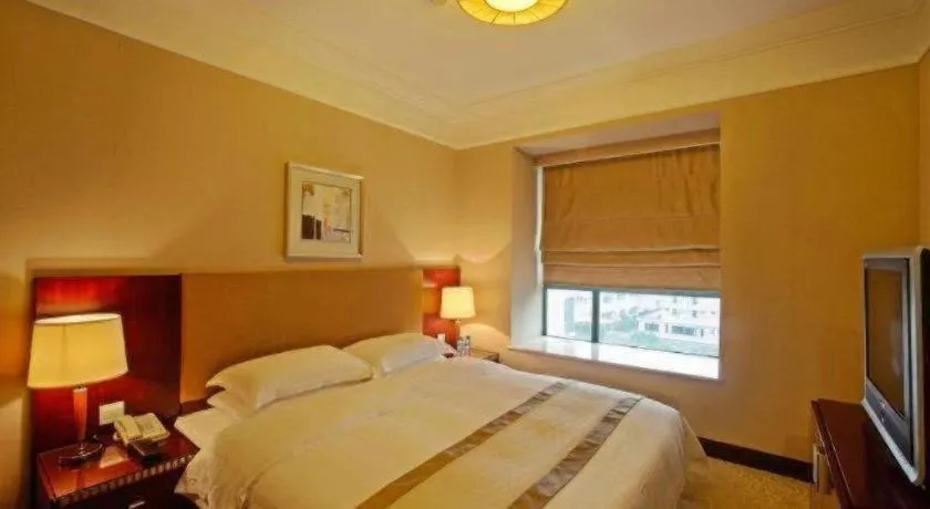 Bed in Golden Diamond Hotel Zhongshan