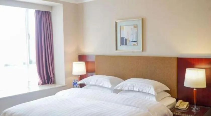 Bed in Golden Diamond Hotel Zhongshan