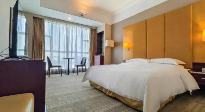 Bed in Golden Diamond Hotel Zhongshan