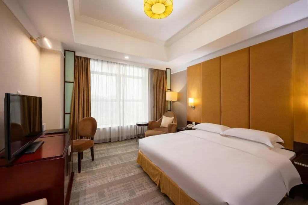 Bed in Golden Diamond Hotel Zhongshan