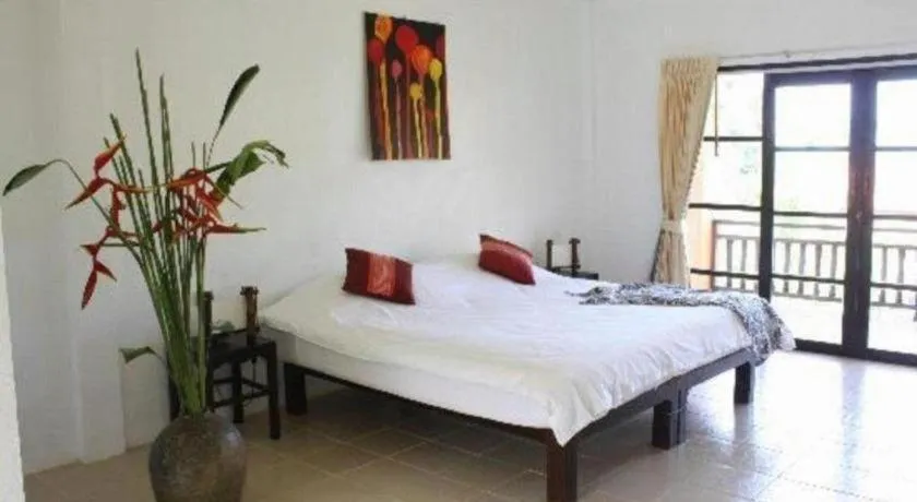 Bed in Khaolak Palm Hill Resort