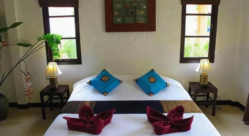 Bed in Khaolak Palm Hill Resort