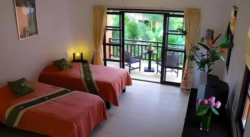 Bed in Khaolak Palm Hill Resort