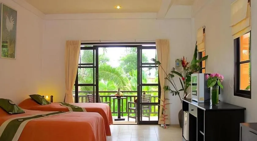 Bed in Khaolak Palm Hill Resort