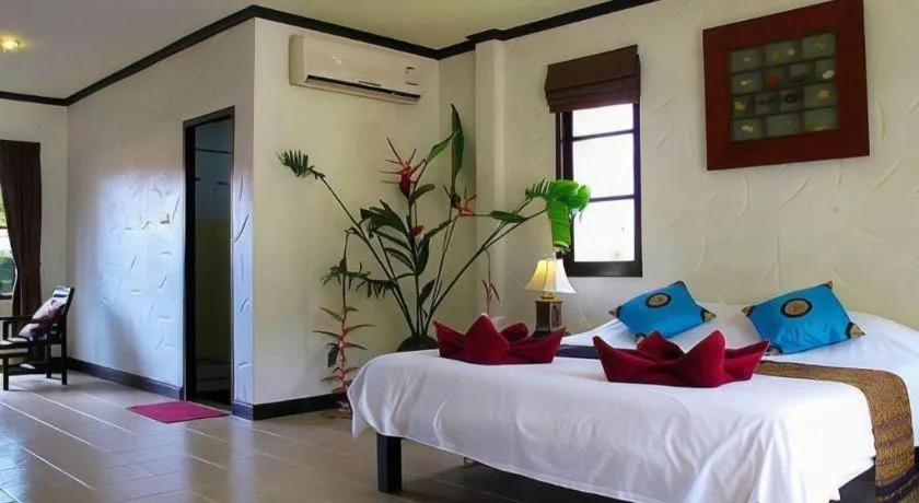 Bed in Khaolak Palm Hill Resort