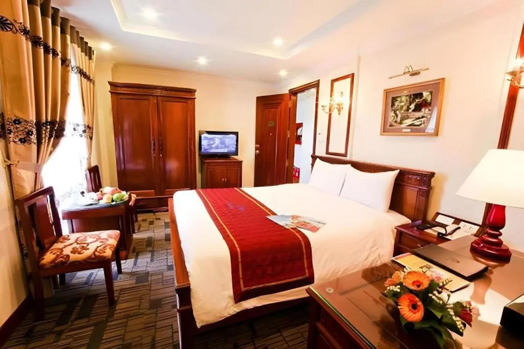 Bed in Eden Hotel Hanoi