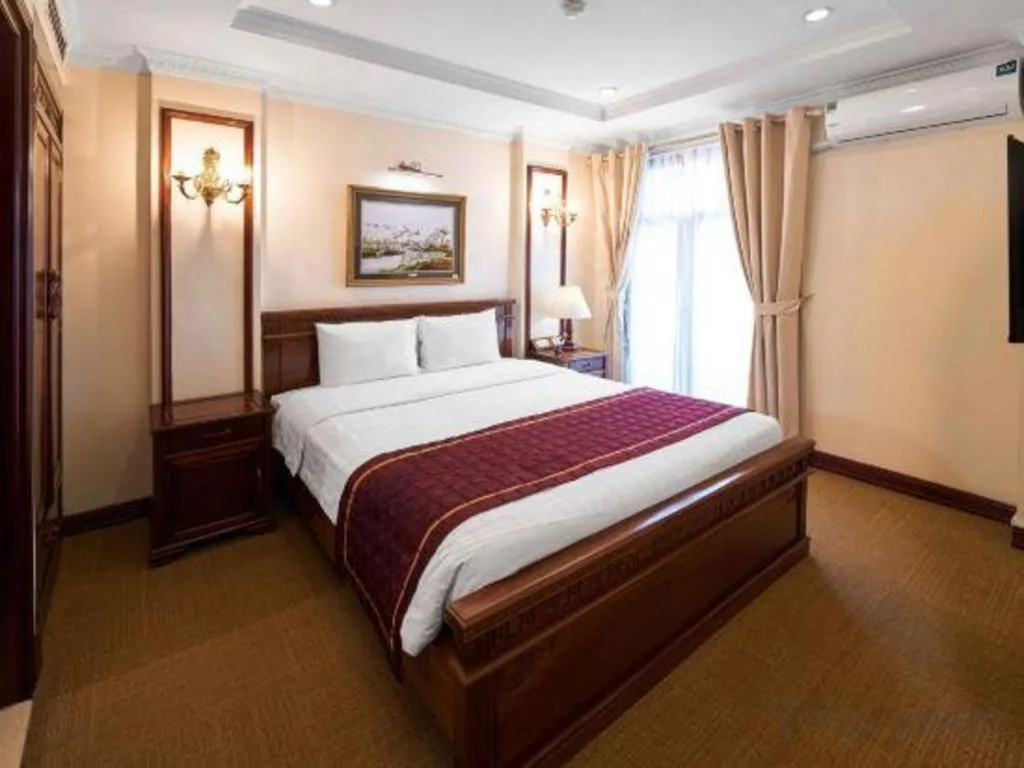 Bed in Eden Hotel Hanoi