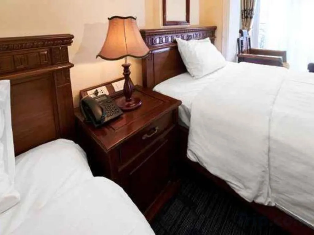 Bed in Eden Hotel Hanoi