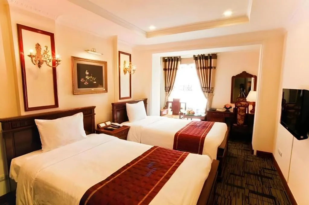 Bed in Eden Hotel Hanoi