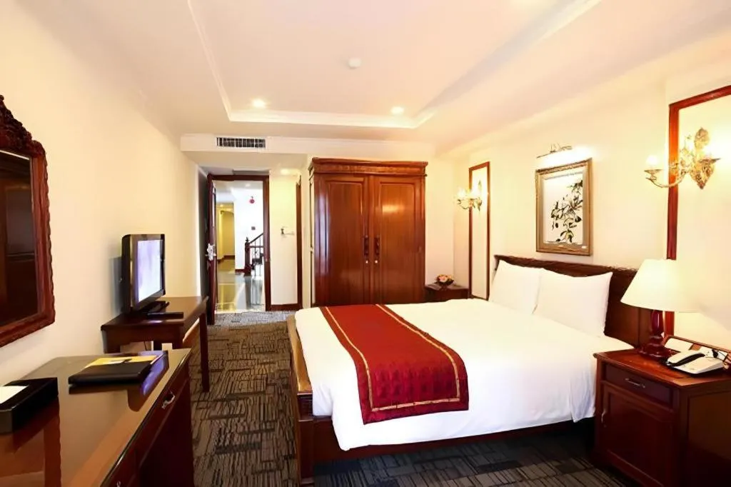 Bed in Eden Hotel Hanoi